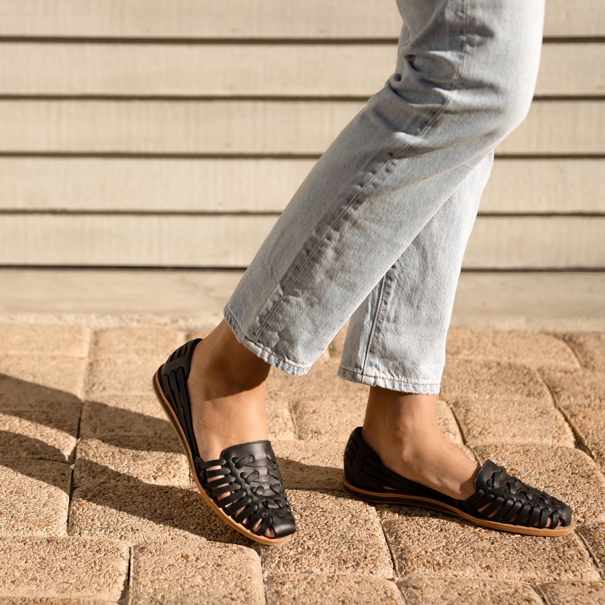 Image 1 Women's Huarache Sandal Black Women's Leather Slip On Nisolo on model